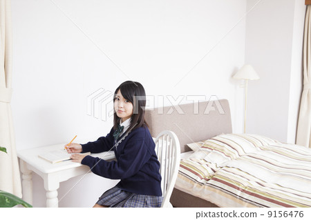 High school girl studying at home High school girl studying at home 9156476