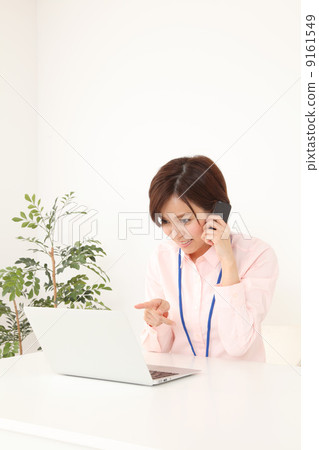 A woman watching a notebook 9161549
