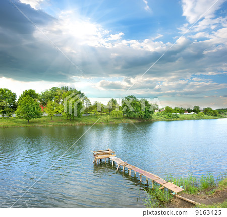 Fishing pier on the river Fishing pier on the river 9163425