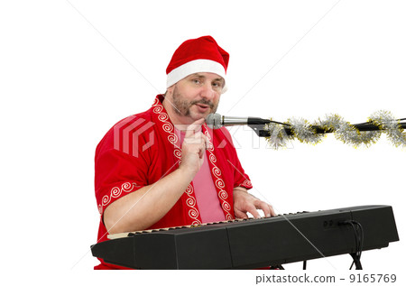 Santa Claus with electric piano 9165769