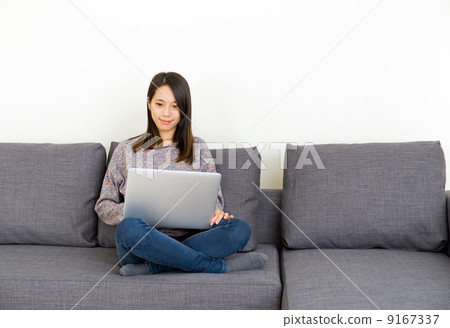 Asian woman working at home Asian woman working at home 9167337