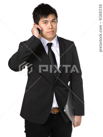 young business man with mobile phone young business man with mobile phone 9168338