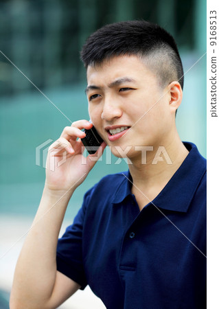 asian man with cell phone 9168513