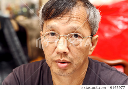 middle age asian man middle age asian man 9168977