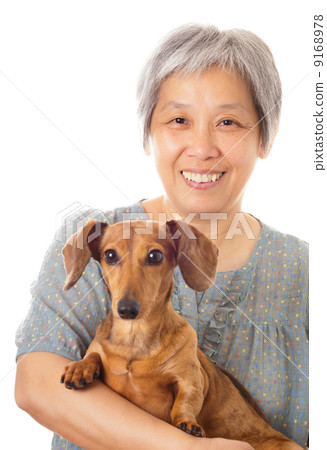 Asian old woman and dachshund dog 9168978