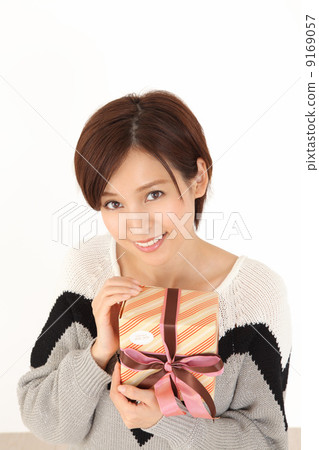 A woman with a present 9169057