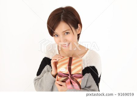A woman with a present 9169059