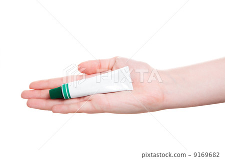 tube with ointment in hand, isolated on a white background 9169682