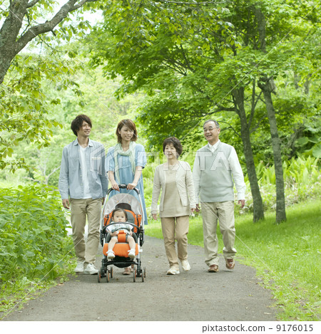 Three generation family walking in fresh green Three generation family walking in fresh green 9176015