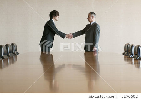 A businessman shaking hands A businessman shaking hands 9176502