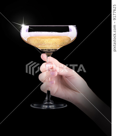 hand making toast with champagne glass 9177625