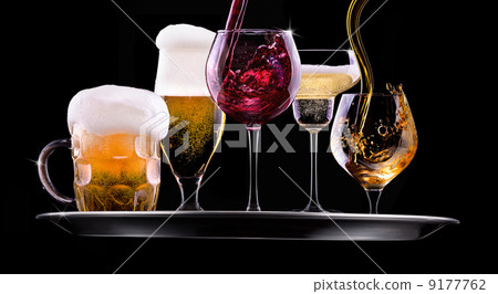 set with different drinks on black background 9177762