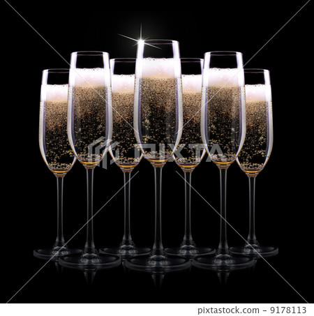 champagne glass on black background champagne glass on black background 9178113