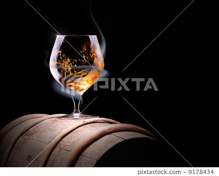 Cognac glass shrouded in a smoke Cognac glass shrouded in a smoke 9178434