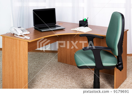 laptop on a desk laptop on a desk 9179691