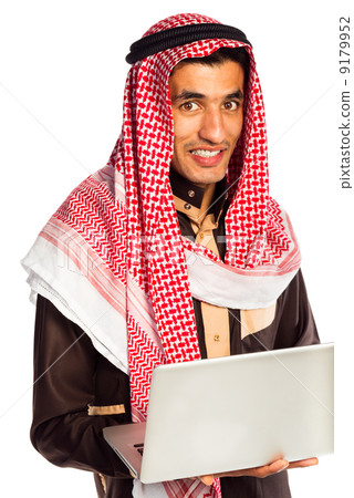 Young smiling arab with laptop isolated on white Young smiling arab with laptop isolated on white 9179952