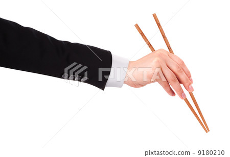 Businessman's hand Holding Chopsticks 9180210