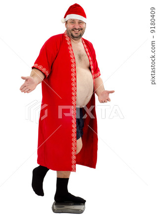 Santa standing on weighting scales Santa standing on weighting scales 9180409