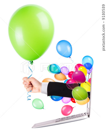 hand with a gift and laptop 9180589