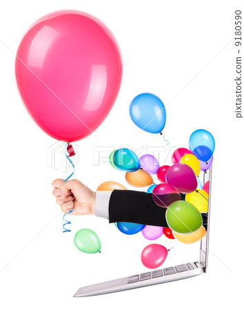 hand with a gift and laptop 9180590