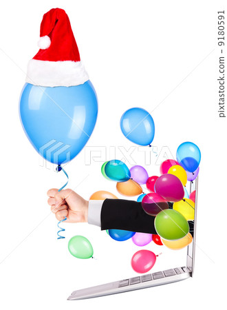 hand with a gift and laptop 9180591