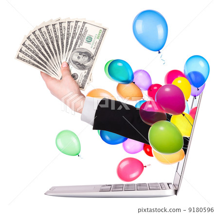 hand with money and laptop 9180596