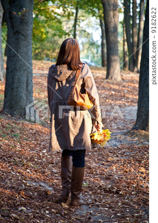 woman in autumn park woman in autumn park 9182622