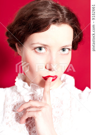 woman with silence gesture 9182661