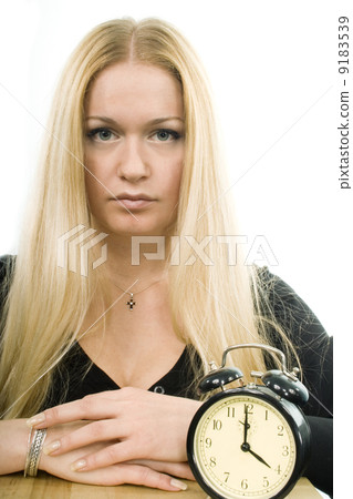 blond woman with clock blond woman with clock 9183539