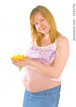 pregnant woman with yellow flowers 9183792
