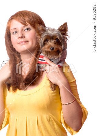 Woman holding terrier 9186292