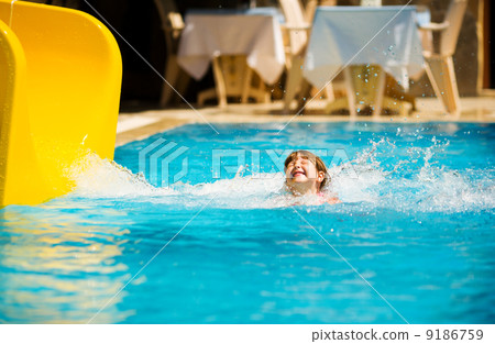 Sliding in pool Sliding in pool 9186759