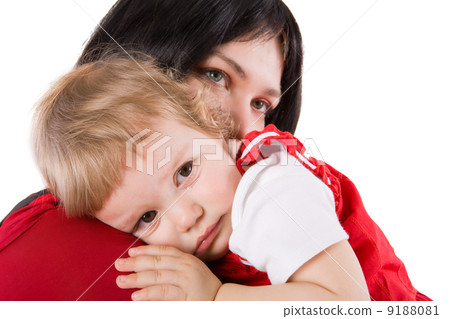 Mother holding crying baby Mother holding crying baby 9188081