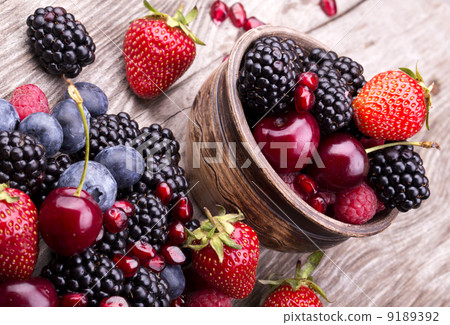 tasty summer fruits on a wooden table tasty summer fruits on a wooden table 9189392