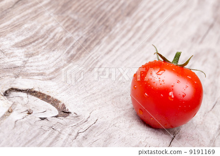 Cherry tomatoes on wooden table 9191169