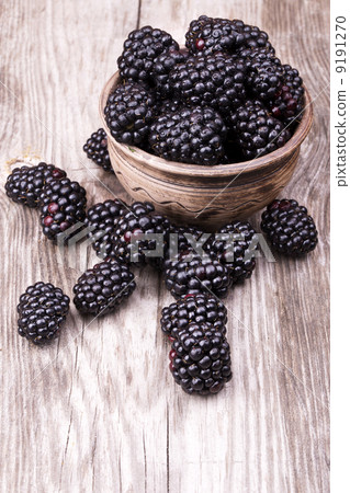 blackberries on wooden table blackberries on wooden table 9191270