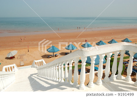 White staircase at the beach of luxury hotel, Ras Al Khaimah, UA White staircase at the beach of luxury hotel, Ras Al Khaimah, UA 9191499