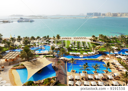 Beach with a view on Jumeirah Palm man-made island, Dubai, UAE Beach with a view on Jumeirah Palm man-made island, Dubai, UAE 9191538