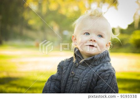Adorable Blonde Baby Boy Outdoors at the Park. 9193338
