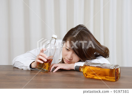 A young woman with alcoholism 9197381