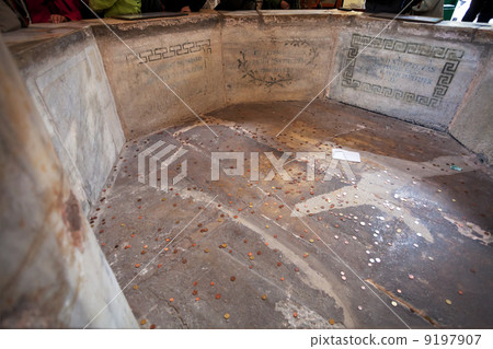 font-stone in the neoniano Baptistery in Ravenna 9197907