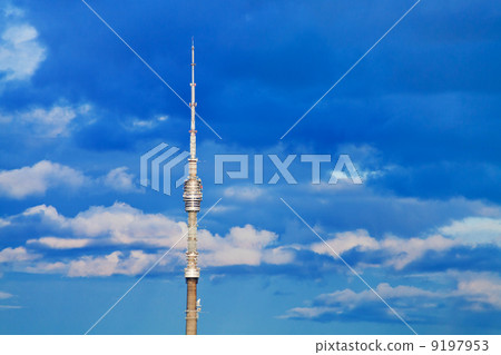 television tower with deep blue cloudy sky 9197953