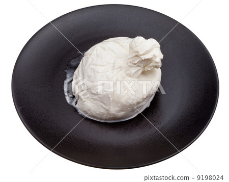 fresh italian cheese burrata on black ceramic plate fresh italian cheese burrata on black ceramic plate 9198024