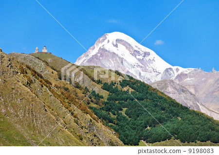 Gergeti Trinity Church and Mount Kazbek in Georgia Gergeti Trinity Church and Mount Kazbek in Georgia 9198083