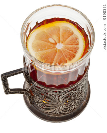 black tea with lemon in vintage glass black tea with lemon in vintage glass 9198551