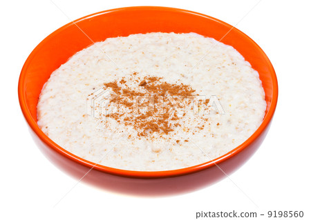 oat porridge with cinnamon in orange bow 9198560