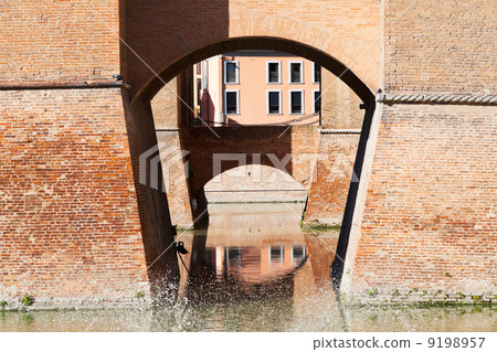 moat and bridges of Castle Estense in Ferrara 9198957