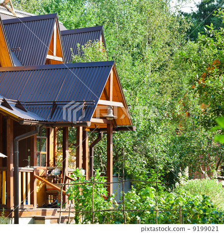 wooden porch of log house 9199021