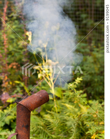 smoke from rusty chimney 9199045