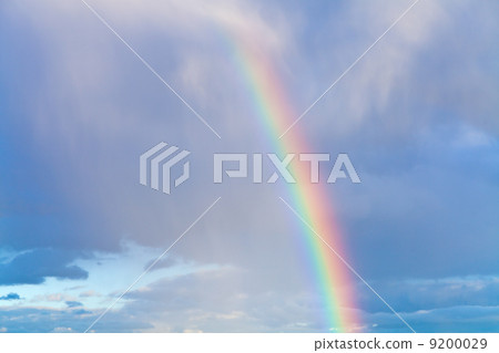 rainbow in blue cloudy sky 9200029